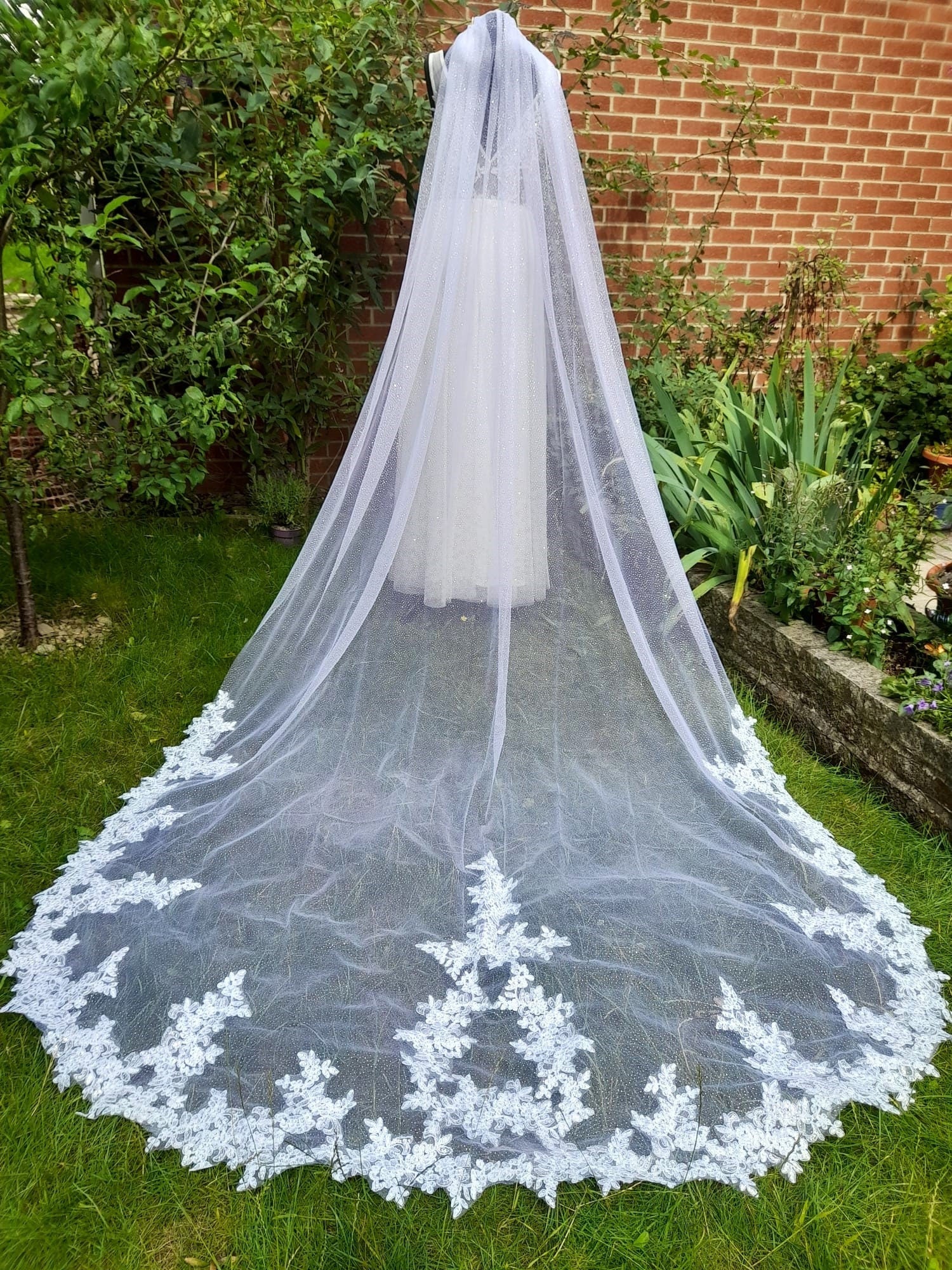 White Cathedral Veil With Glitter And Lace Edge And A Comb