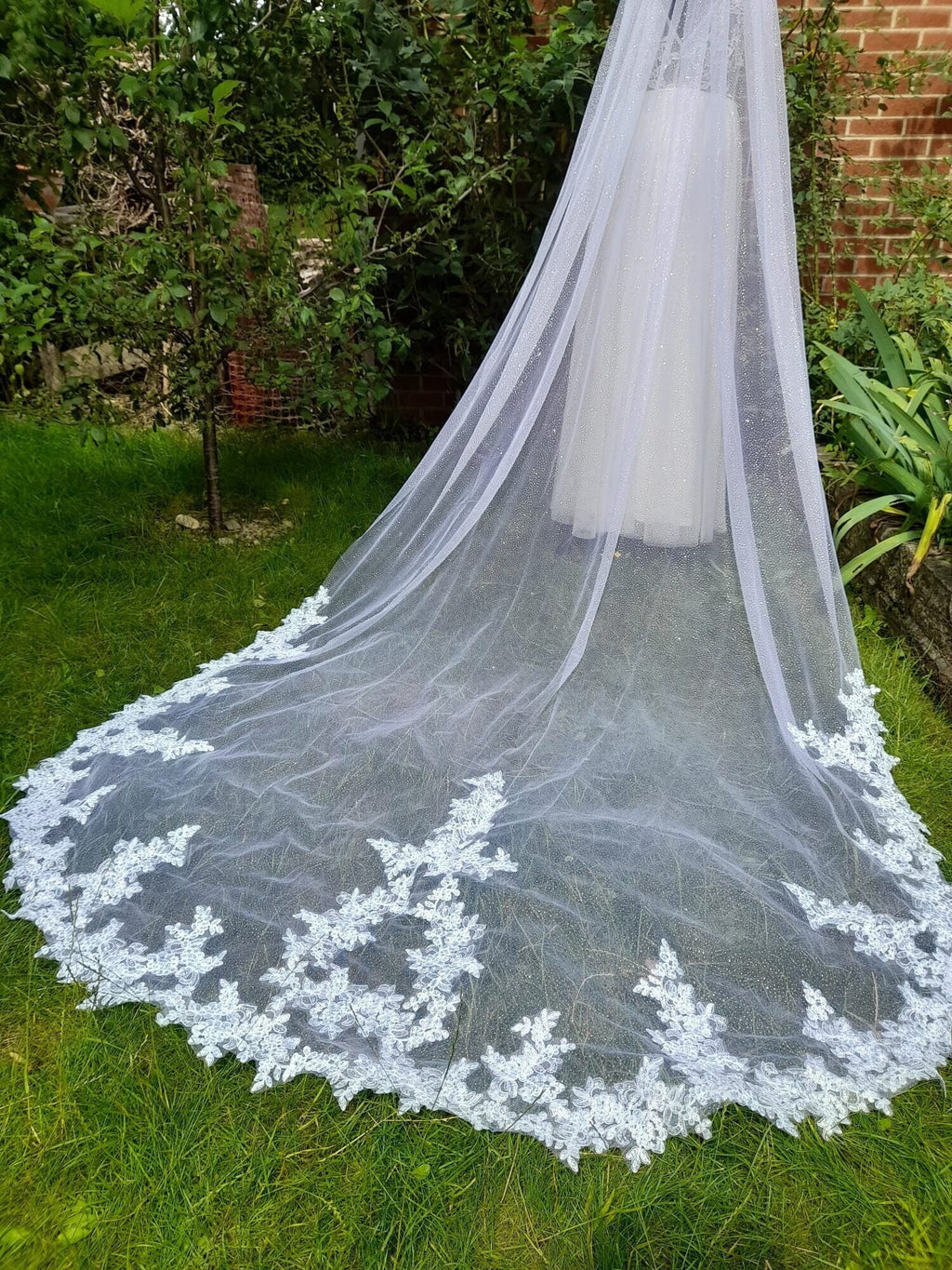 White Cathedral Veil With Glitter And Lace Edge And A Comb