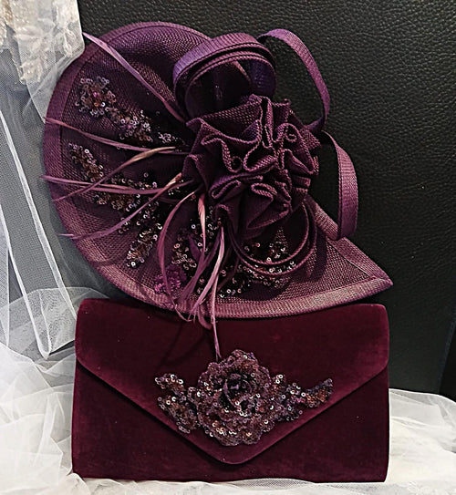 Purple fascinator and matching clutch bag with floral embellishments on a white and black background.