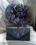 Navy Blue embroidered hat and clutch bag on a white lace background