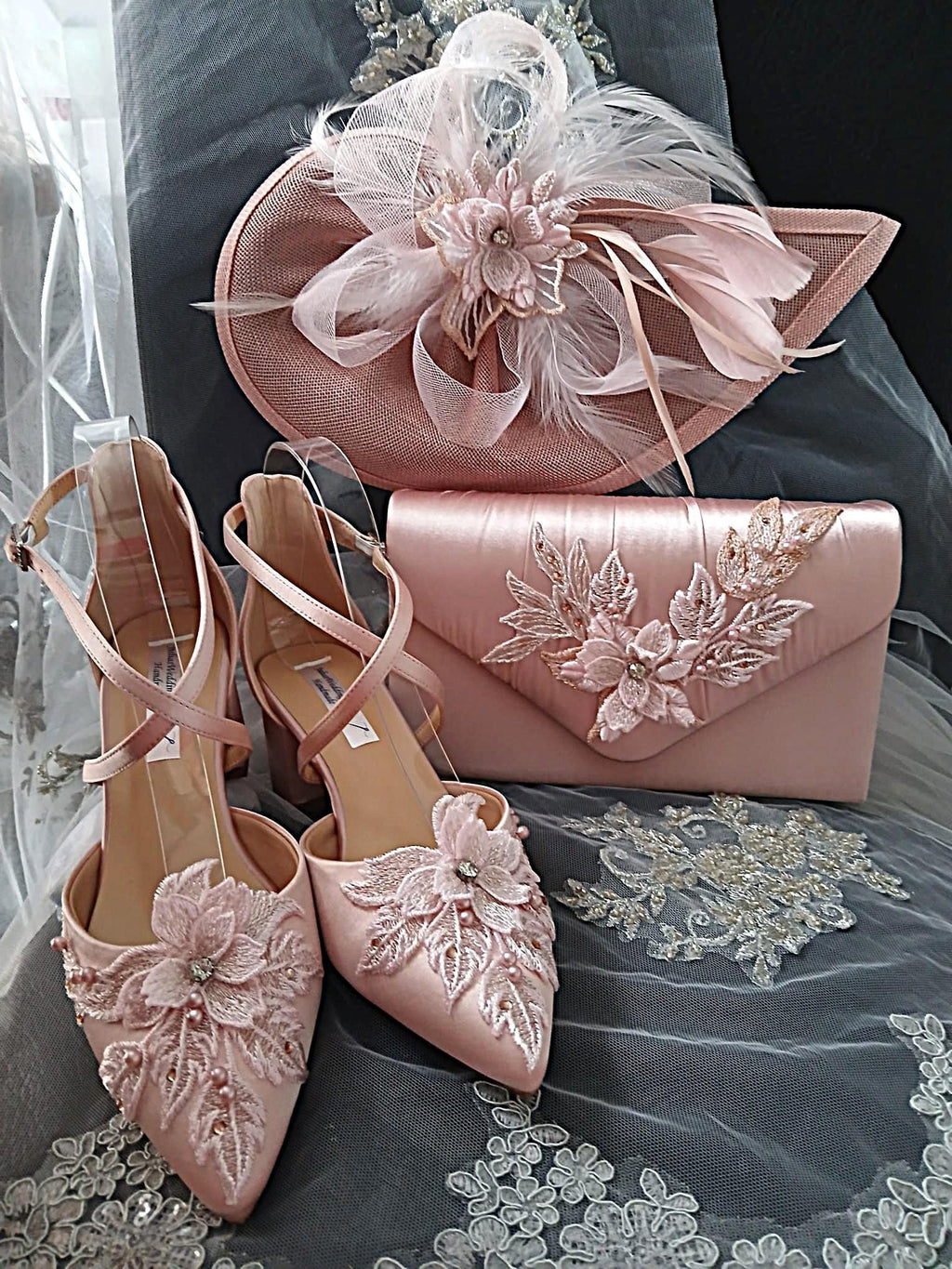 Pink shoes and handbag and hat with floral details 